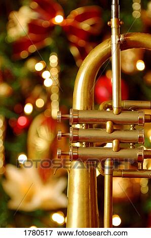 Trumpet at Christmas time View Large Photo Image Stock Photo - Trumpet at Christmas time. Fotosearch