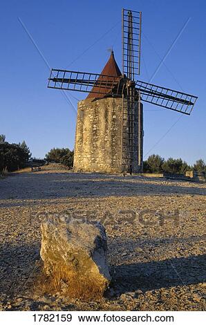 Stock Photo - Unique windmill, Fontvielle, Provence, Franc. Fotosearch
