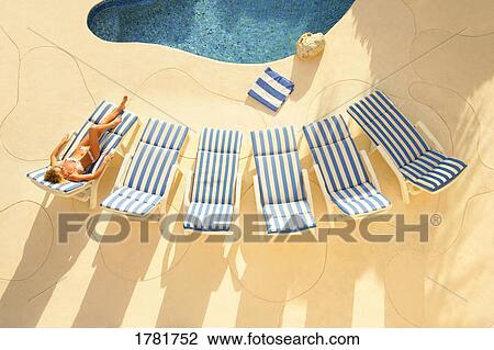 Vacation by the pool View Large Photo Image Stock Image - Vacation by the pool. Fotosearch