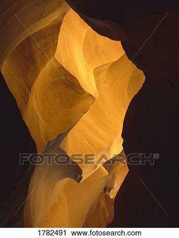 Stock Image - View thorough sunlit canyon. Fotosearch