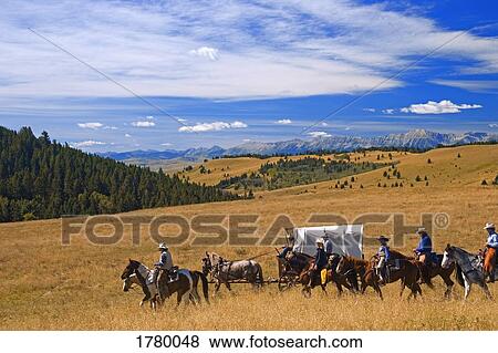 Stock Photo - Wagon Train. Fotosearch