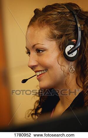 Stock Image - Woman at work. Fotosearch