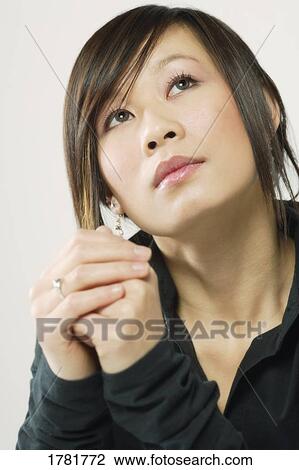 Woman deep in thought View Large Photo Image Stock Image - Woman deep in thought. Fotosearch