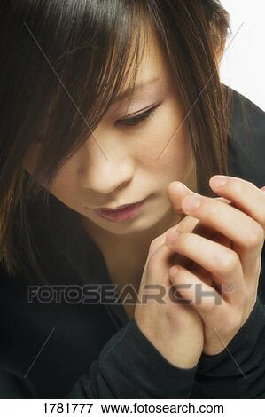 Woman deep in thought View Large Photo Image Stock Photo - Woman deep in thought. Fotosearch