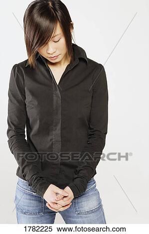 Stock Photography - Woman deep in thought. Fotosearch