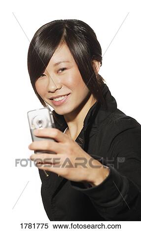 Stock Photography - Woman holding an i-Pod. Fotosearch
