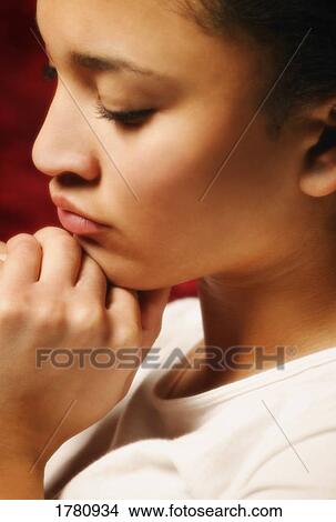 Woman praying View Large Photo Image Picture - Woman praying. Fotosearch