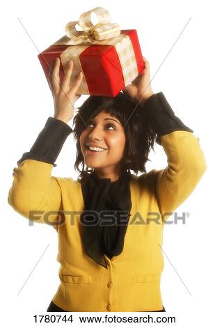 Picture - Woman with a present. Fotosearch
