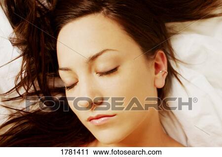 Woman with eyes closed View Large Photo Image Stock Image - Woman with eyes closed. Fotosearch