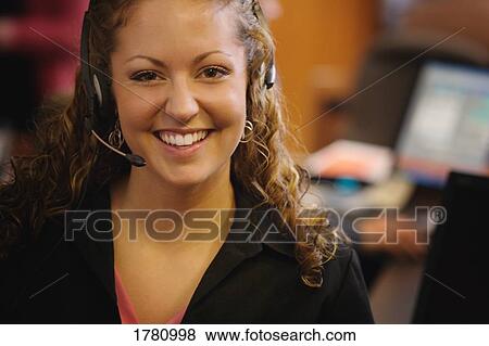 Stock Photo - Woman with headset. Fotosearch