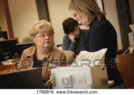 Women at work View Large Photo Image Stock Photograph - Women at work. Fotosearch