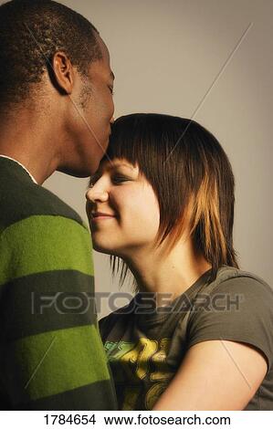 Picture - A kiss on the forehead.. Fotosearch