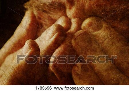 Stock Photograph - A man shutting his eyes. Fotosearch