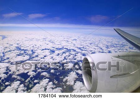 Picture - Airplane in flight. Fotosearch