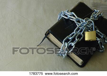 Bible in chains View Large Photo Image Stock Photography - Bible in chains. Fotosearch