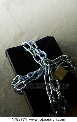 Book in chains View Large Photo Image Picture - Book in chains. Fotosearch