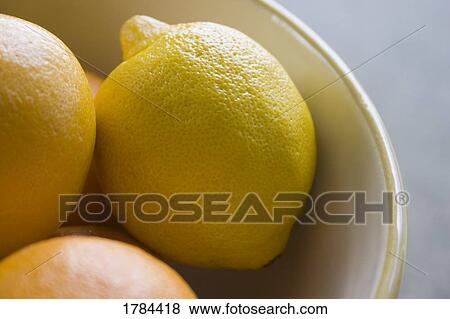 Bowl of citrus fruit View Large Photo Image Stock Photo - Bowl of citrus fruit. Fotosearch