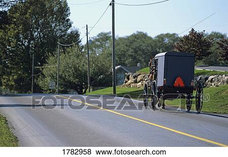 Buggy going down the road View Large Photo Image Stock Photo - Buggy going down the road. Fotosearch