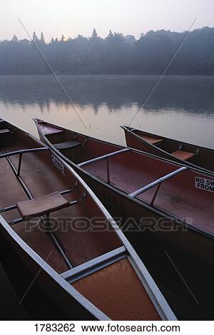 Canoes on Still Water View Large Photo Image Stock Image - Canoes on Still Water. Fotosearch