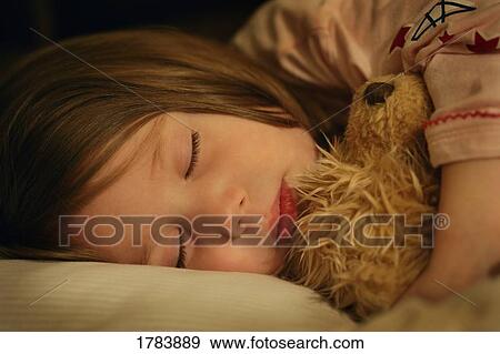 Stock Photo - Child sleeping peacefully. Fotosearch