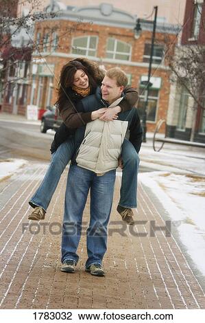 Couple winter walk View Large Photo Image Stock Image - Couple winter walk. Fotosearch