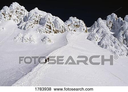 Stock Photo - Distant climbers, Mount Hood.. Fotosearch