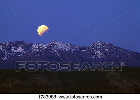 Eclipsed moonrise over Hell's Canyon National Recreation area View Large Photo Image Stock Photo - Eclipsed moonrise over Hell's Canyon National Recreation area. Fotosearch