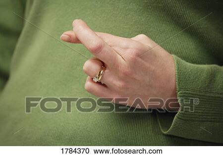 Fingers crossed View Large Photo Image Stock Image - Fingers crossed. Fotosearch