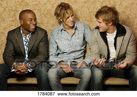 Group of guys hanging out View Large Photo Image Stock Photo - Group of guys hanging out. Fotosearch