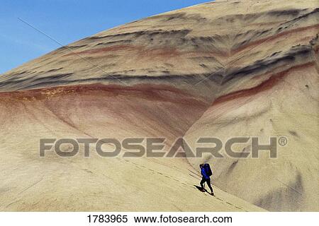 Hiker, Painted Hills desert, John Day National Fossil Beds View Large Photo Image Stock Photography - Hiker, Painted Hills desert, John Day National Fossil Beds. Fotosearch