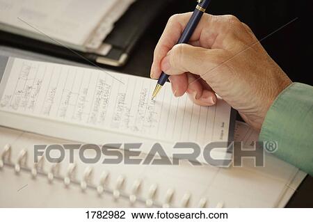 Stock Image - List being written. Fotosearch