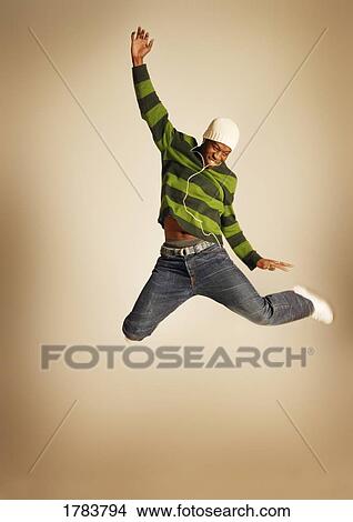 Picture - Man listening to music. Fotosearch