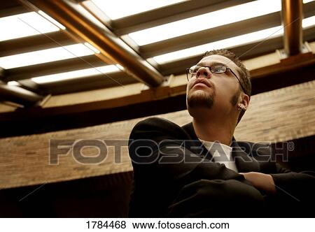 Man looking up View Large Photo Image Stock Photo - Man looking up. Fotosearch