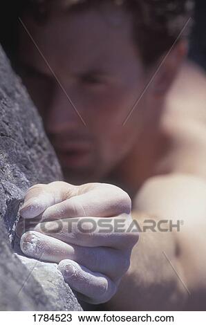 Man rock climbing View Large Photo Image Stock Image - Man rock climbing. Fotosearch