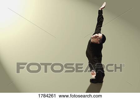 Man with his hands raised View Large Photo Image Stock Image - Man with his hands raised. Fotosearch