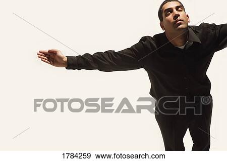 Stock Photo - Man with his hands raised. Fotosearch