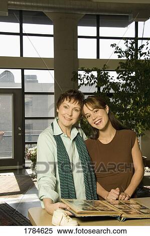 Mother and Daughter Smiling View Large Photo Image Stock Photography - Mother and Daughter Smiling. Fotosearch