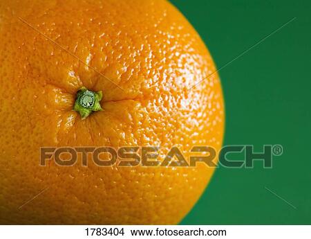 Orange fruit on green background View Large Photo Image Picture - Orange fruit on green background. Fotosearch