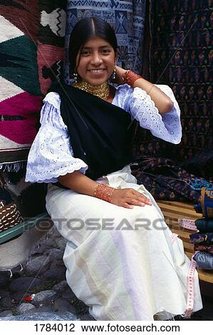 Stock Image - Portrait of Ecuadorian woman at market.. Fotosearch