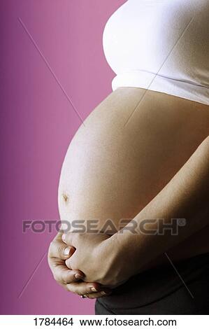 Pregnant Belly With Hands View Large Photo Image Picture - Pregnant Belly With Hands. Fotosearch
