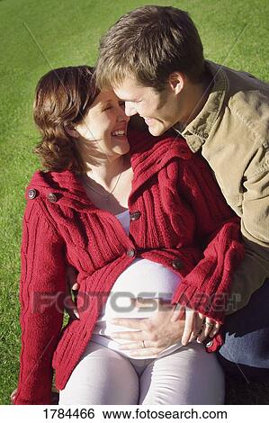 Pregnant couple View Large Photo Image Stock Photograph - Pregnant couple. Fotosearch