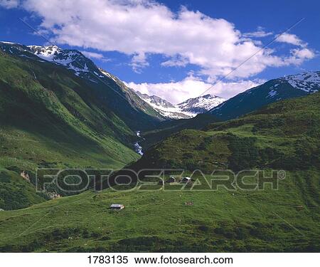 Stock Photography - Scene in Swiss Alps with farm. Fotosearch