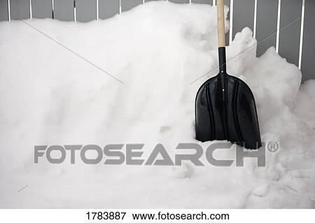 Shovel and snow View Large Photo Image Stock Photo - Shovel and snow. Fotosearch