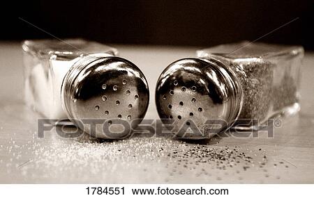 Spilt salt and pepper shakers View Large Photo Image Stock Image - Spilt salt and pepper shakers. Fotosearch