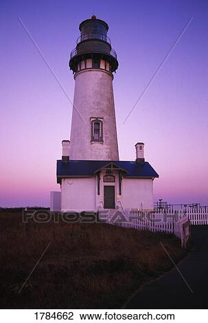 Stock Image - Sunset on Yaquina Head Lighthouse. Fotosearch