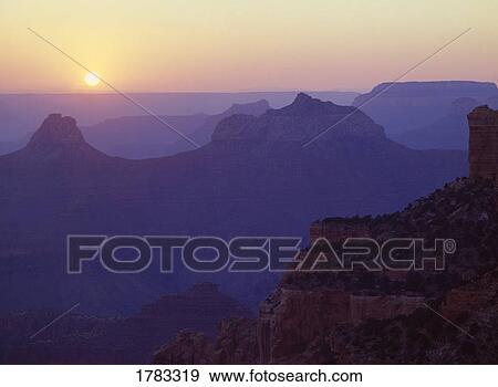 Stock Photo - Sunset over buttes, Grand Canyon National Park. Fotosearch