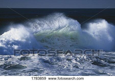 Stock Photo - Waves crashing, ocean spray, Pacific coast.. Fotosearch