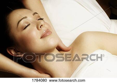Woman having massage View Large Photo Image Stock Image - Woman having massage. Fotosearch