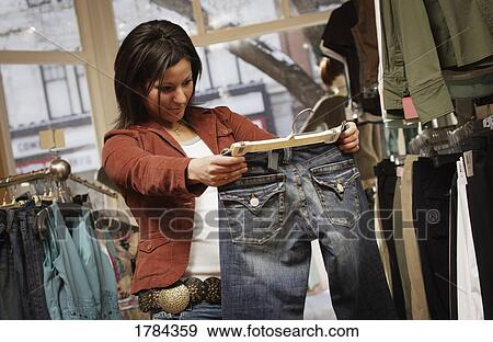 Stock Photo - Woman shopping. Fotosearch