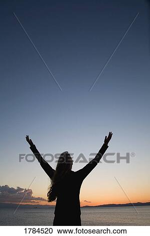 Stock Image - Woman worshipping. Fotosearch